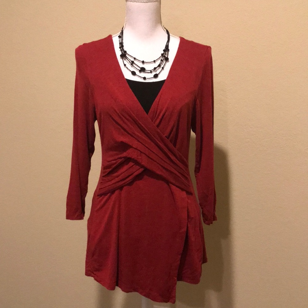 Red long sleeved V neck